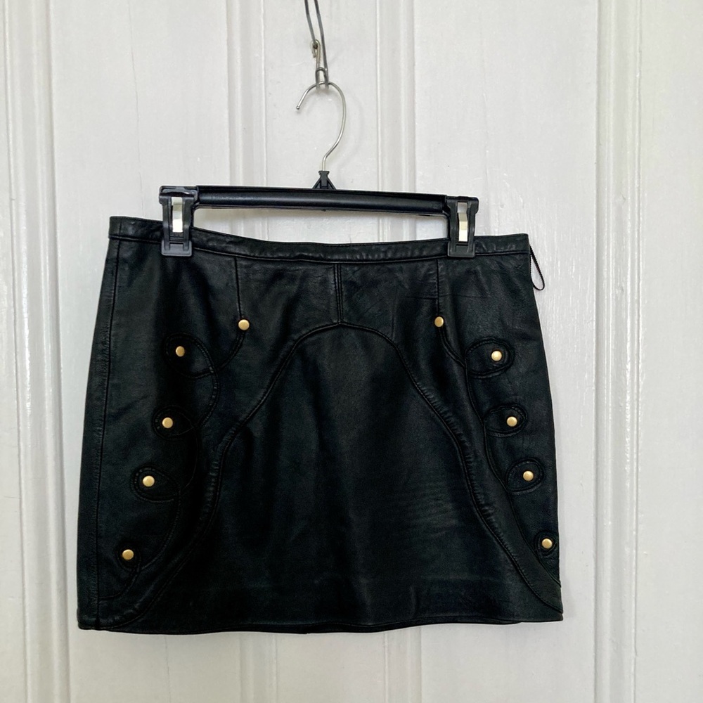 Leather skirt with gold detail